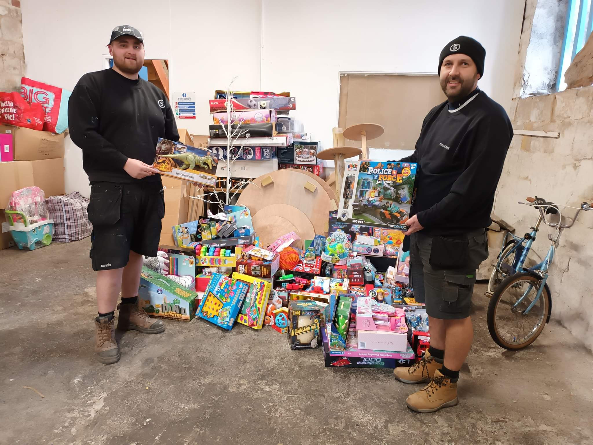 Stage One provide Christmas gifts for charity toy bank